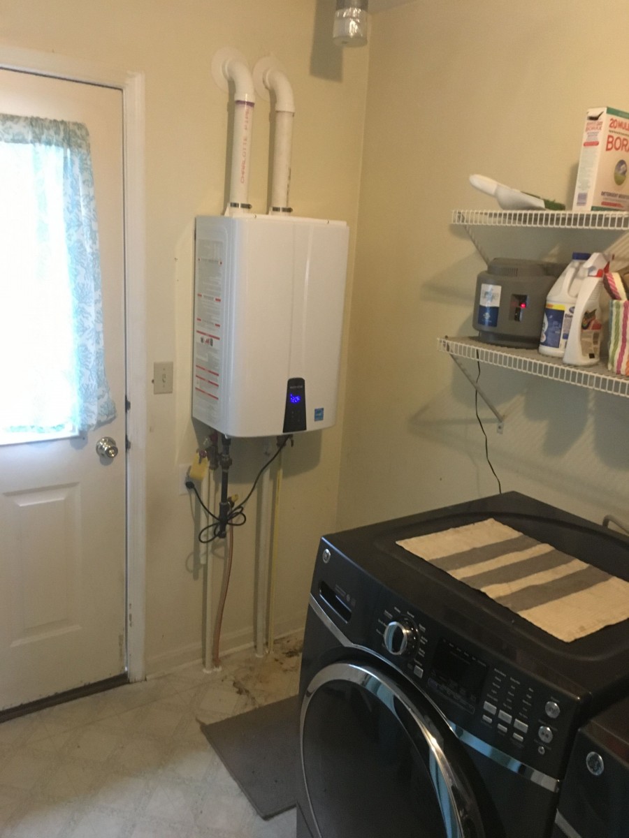 Tankless water heater installed in laundry room
